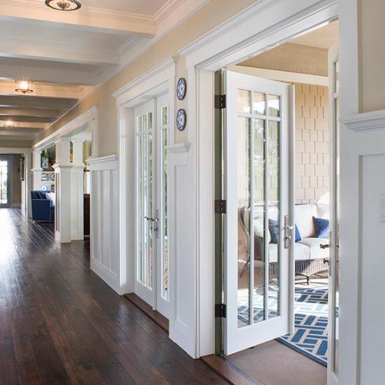 Hampton's Style Entryway with French Doors Designed by HartmanBaldwin